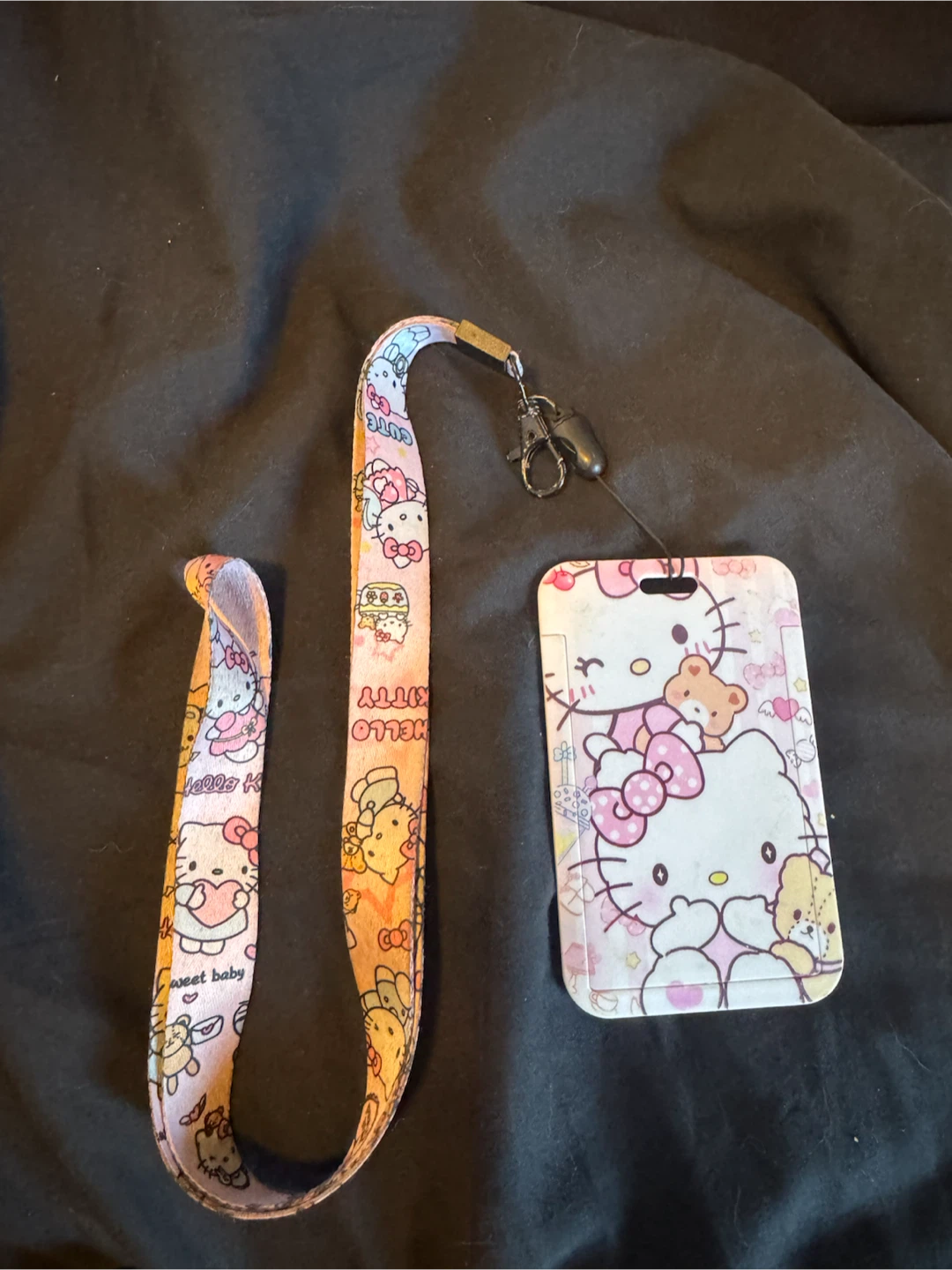 Hello kitty land yard with compass card