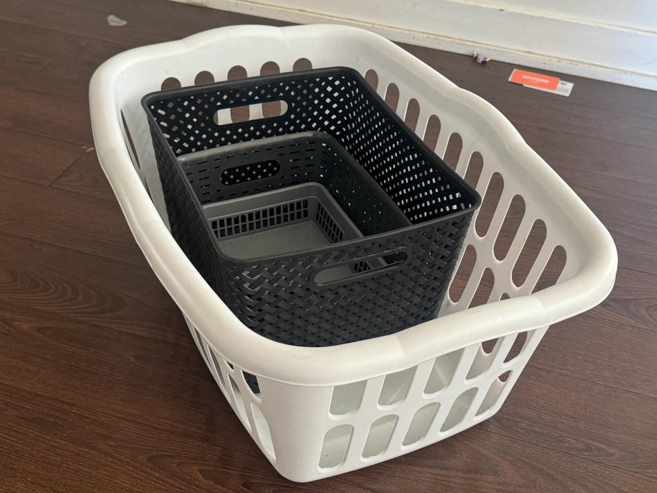 Assorted Plastic Storage Baskets and Laundry Hamper