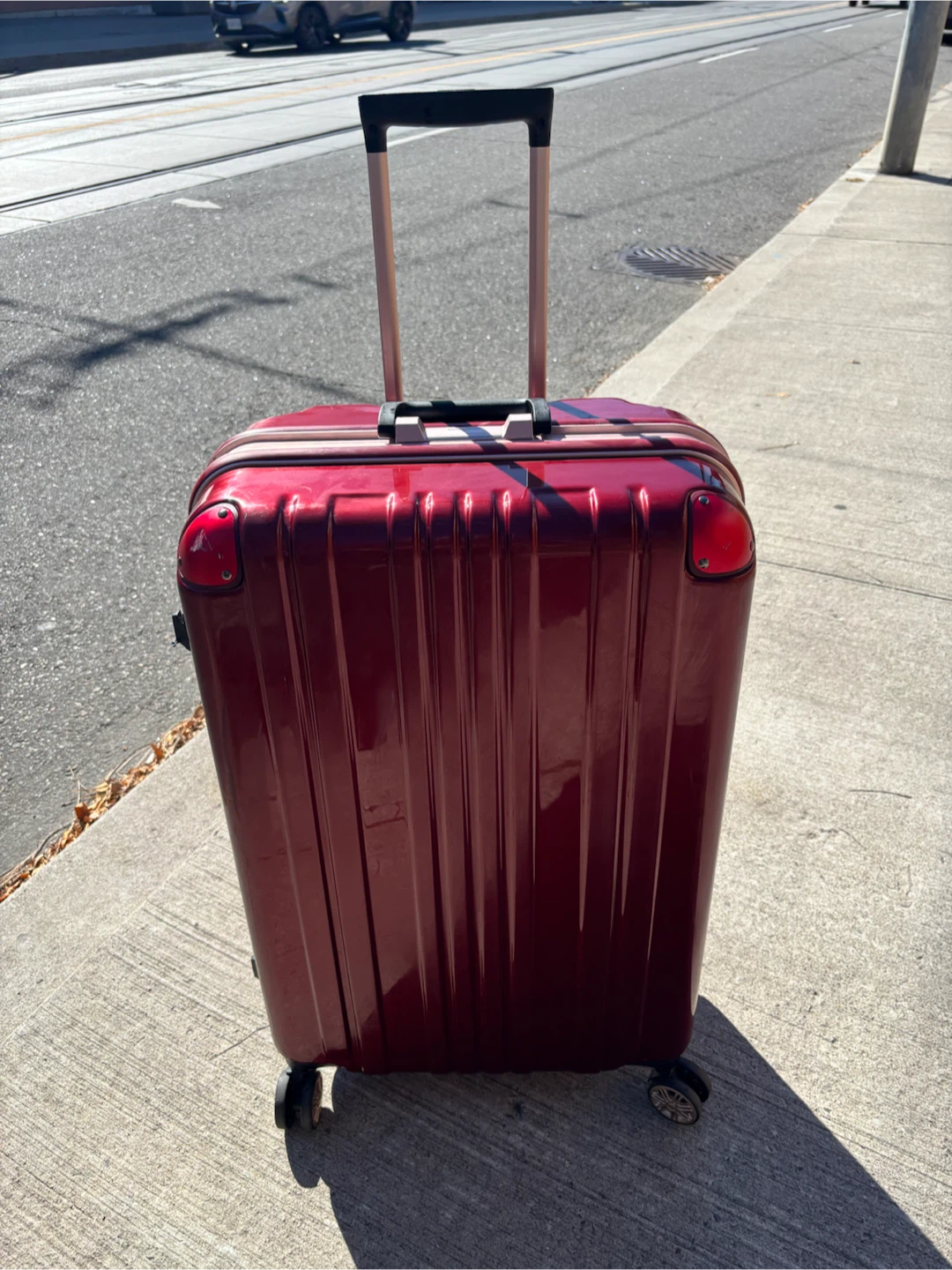 Large Check In Red hardshell suitcase with wheels - photo 3