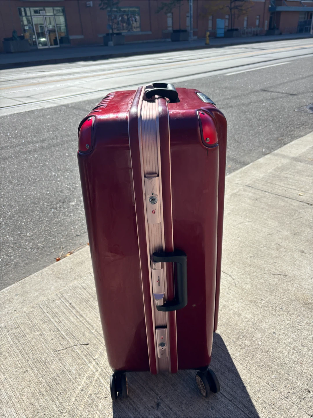 Large Check In Red hardshell suitcase with wheels - photo 4