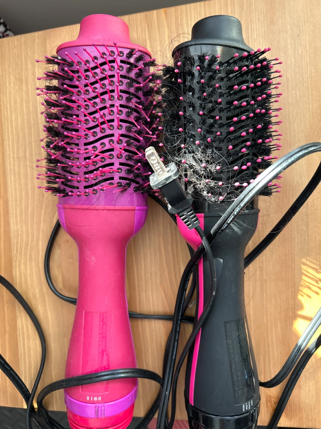 Two Revlon One-Step Volumizer Hair Dryers