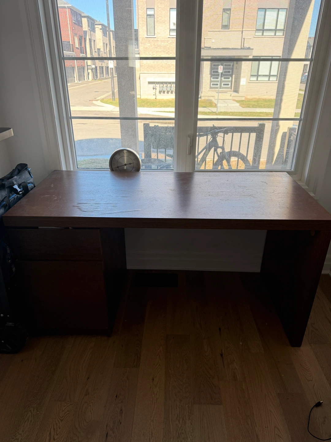 Dark wood desk with storage drawer