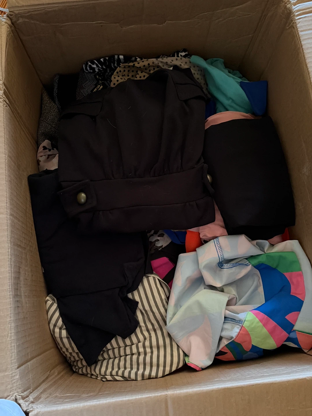 Giving away new clothes for women .