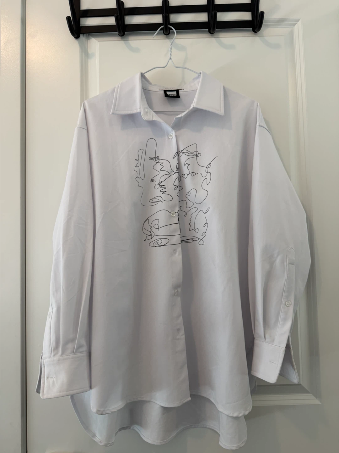 Stylish White long-sleeve graphic button-up shirt