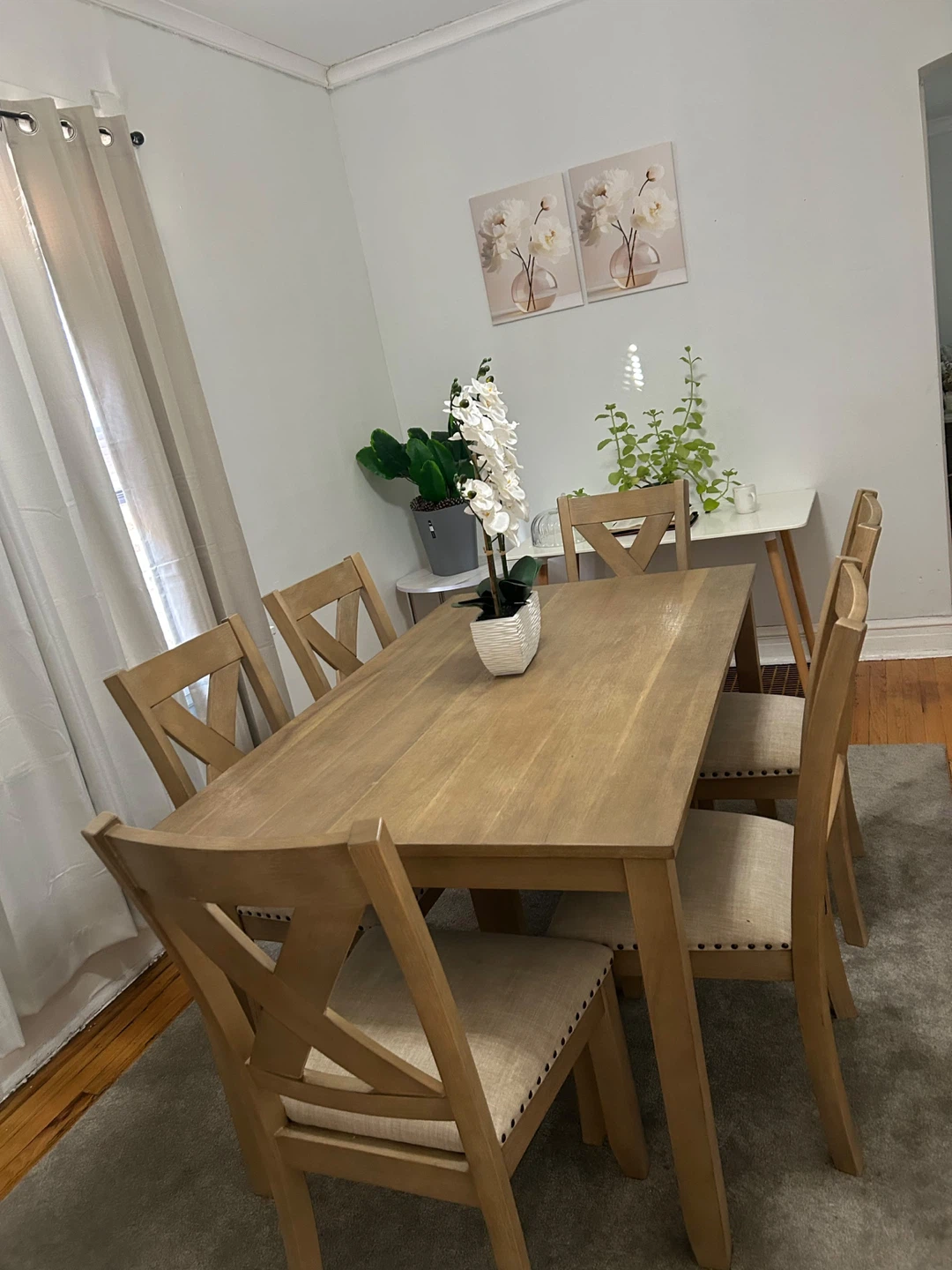 Dining room and sofa and a TV are available