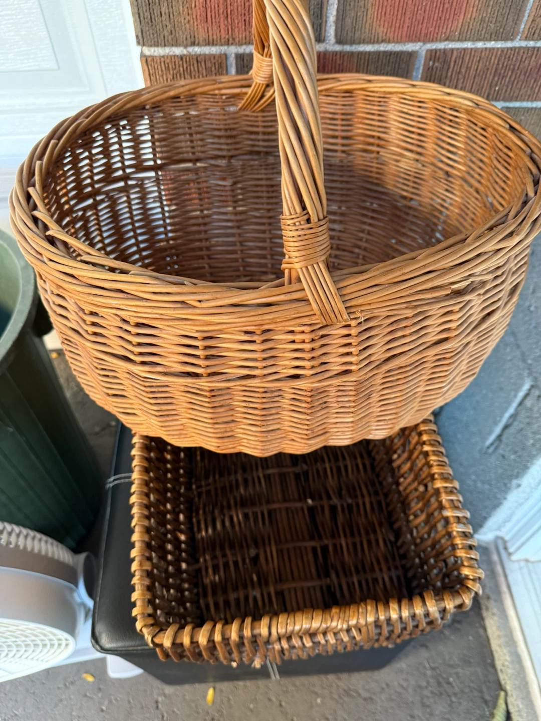 Set of two woven wicker baskets
