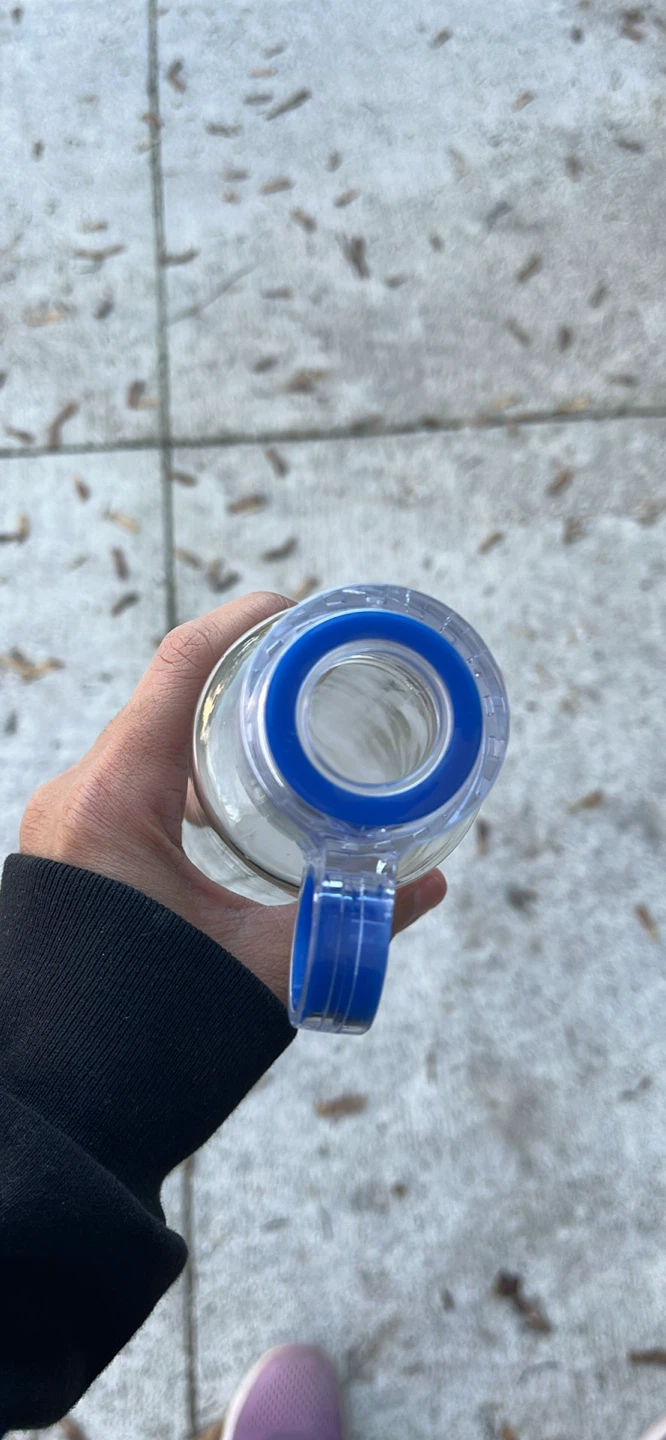 Clear glass water bottle with blue carry loop - photo 2
