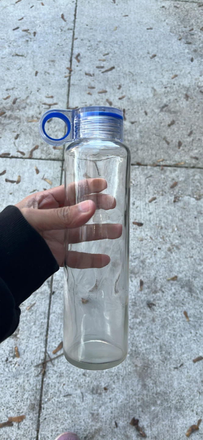 Clear glass water bottle with blue carry loop - photo 3
