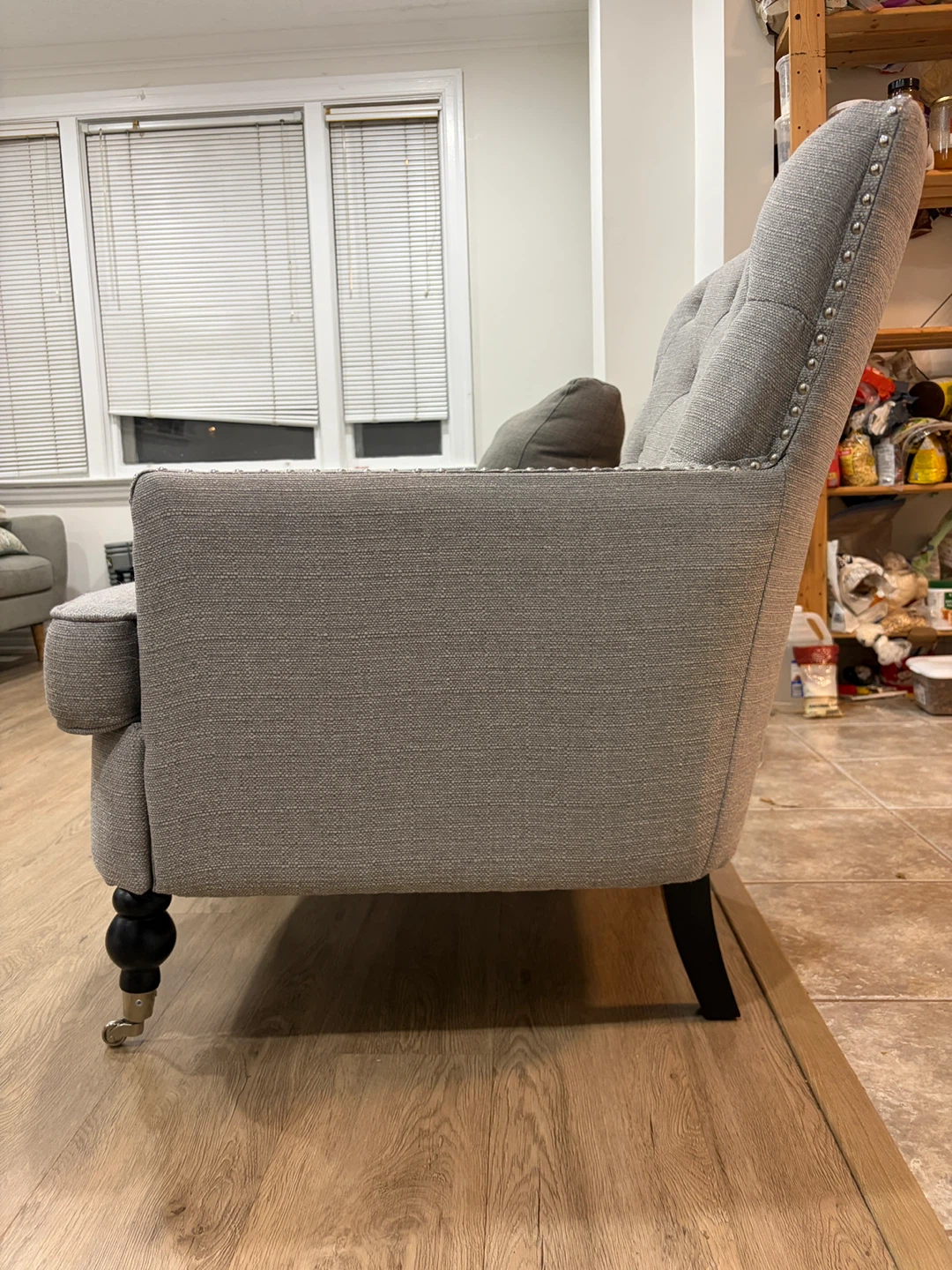 Grey tufted accent chair with casters - photo 3