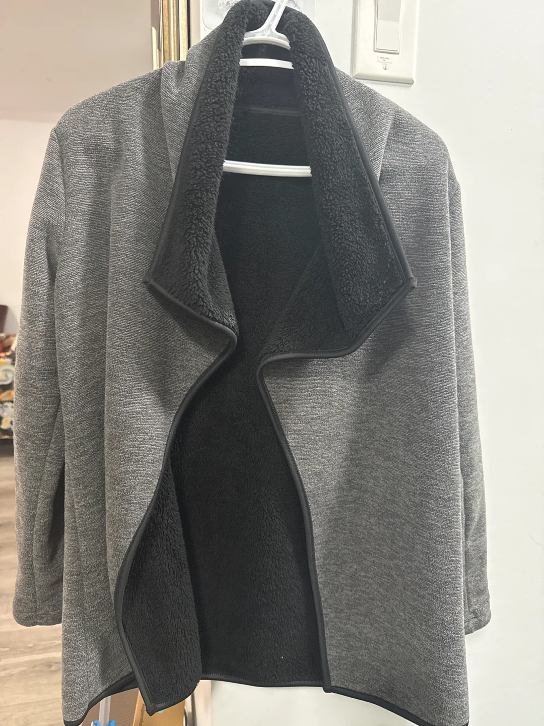 Grey and black fleece-lined cardigan