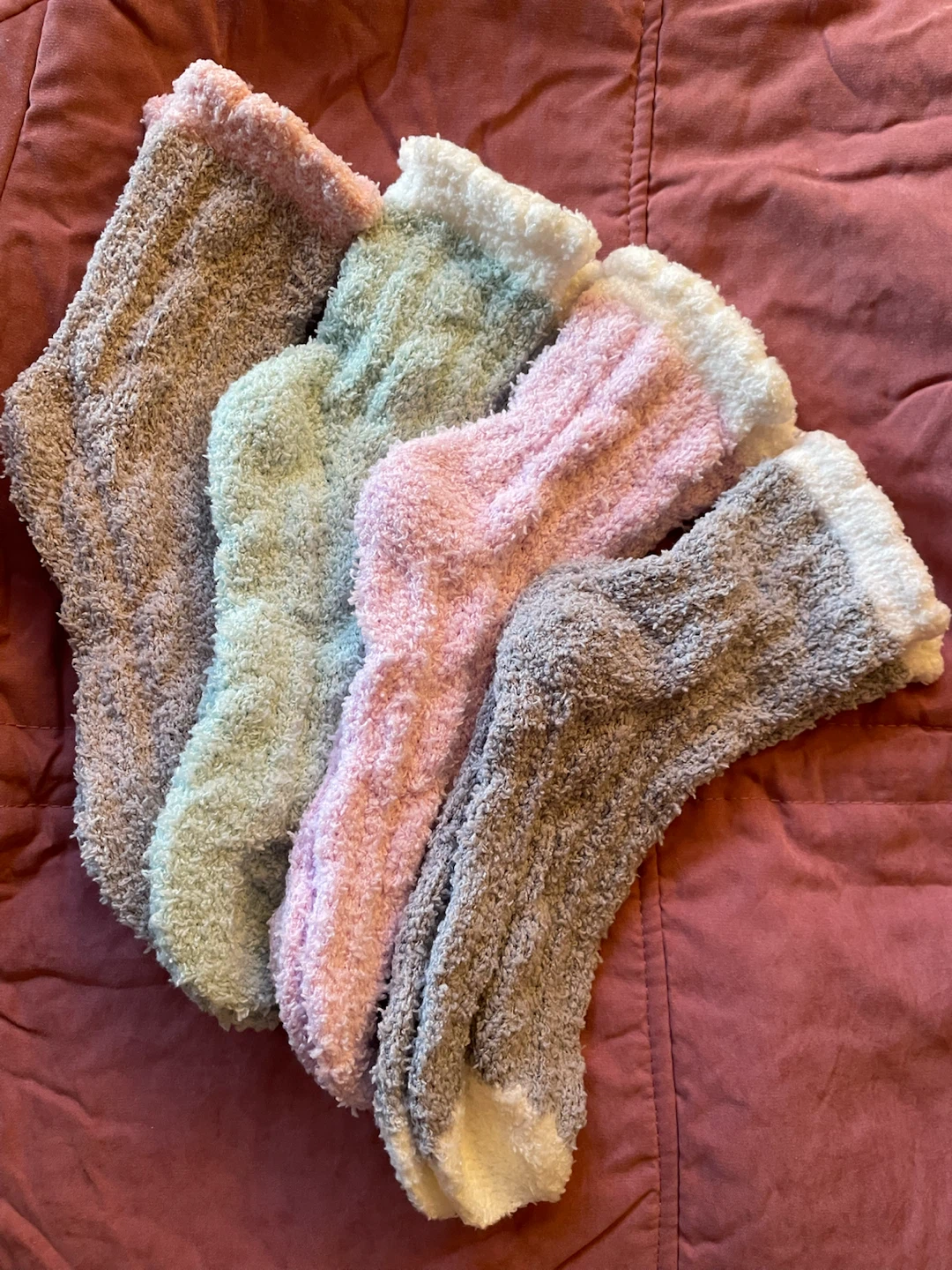 Four pairs of fuzzy plush socks