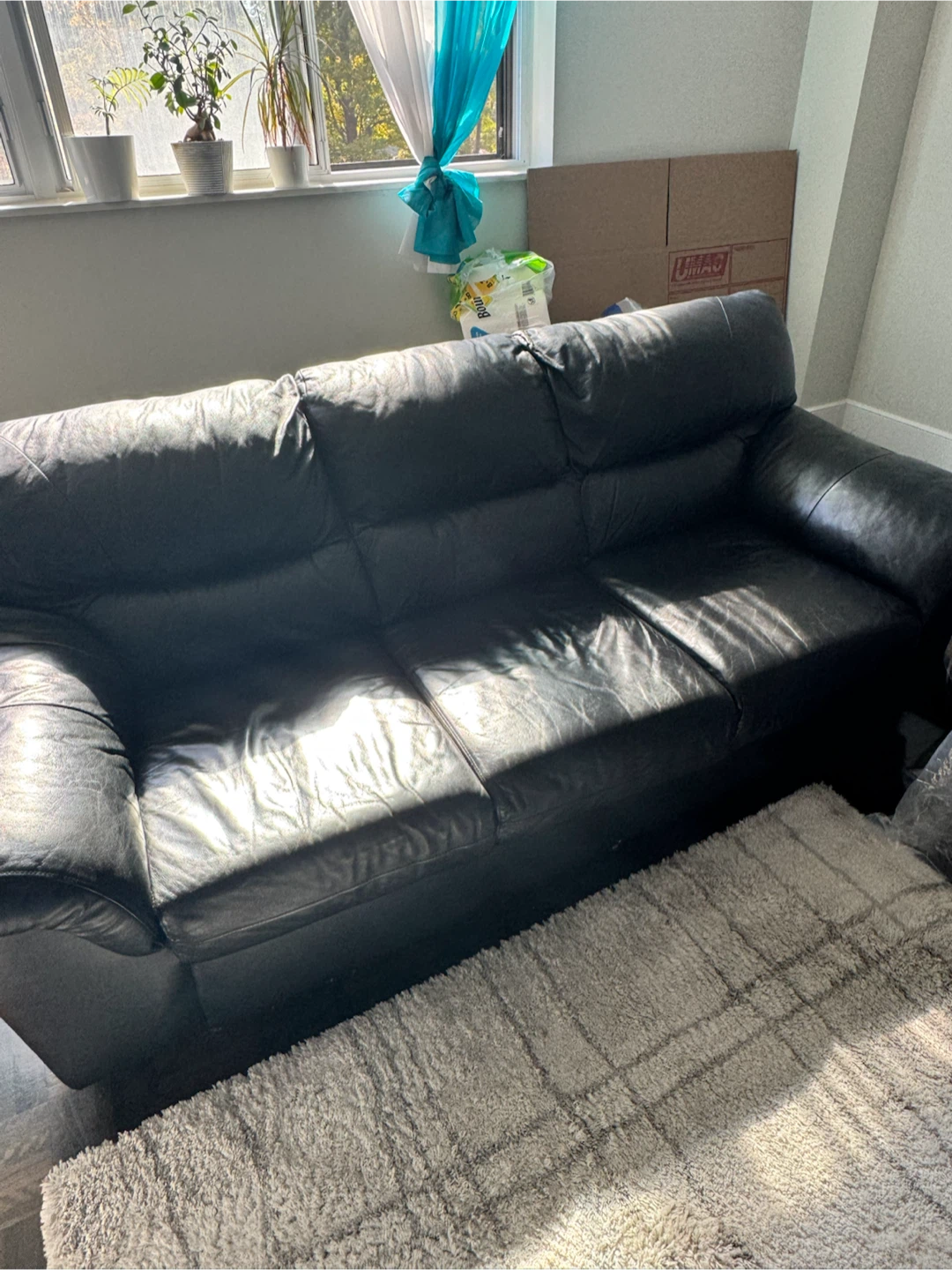 Black Leather Three-Seater Sofa