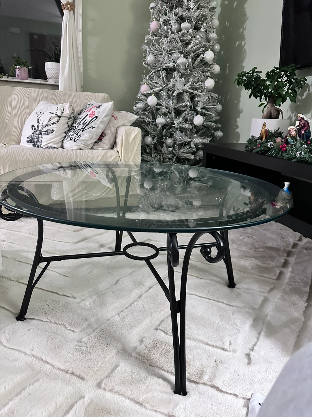 Oval Glass Coffee Table with Black Metal Base