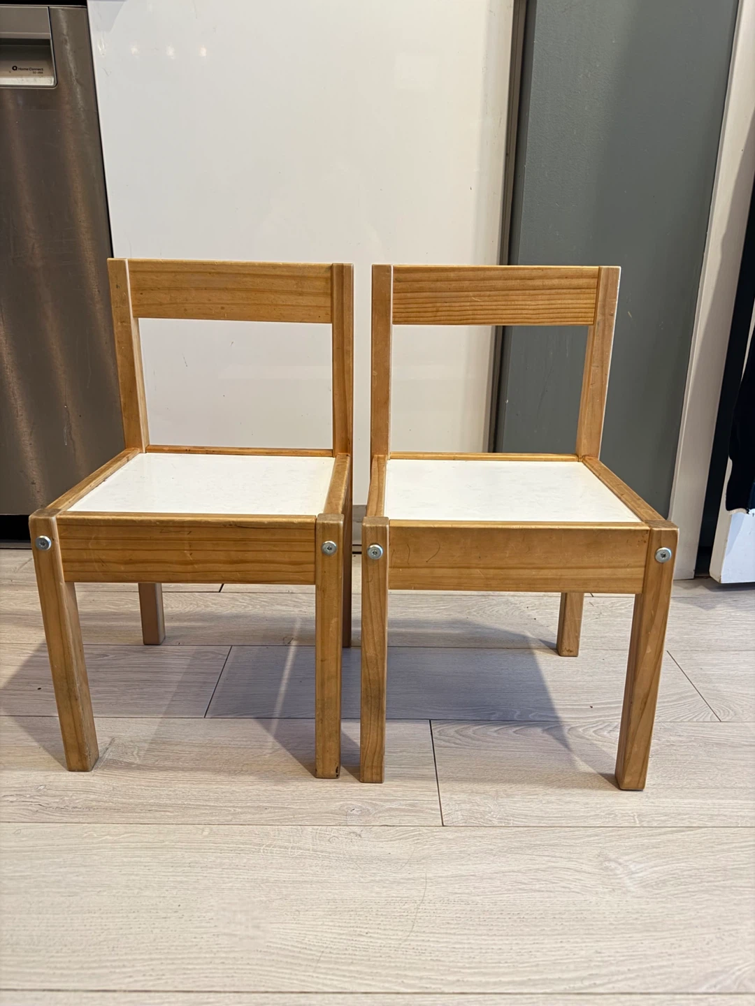 Two IKEA FLISAT children's chairs