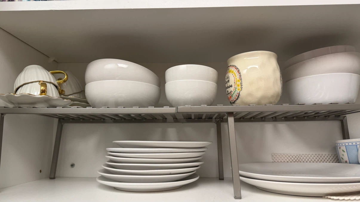 White Dinnerware Plates, Cups and Kitchen Shelf