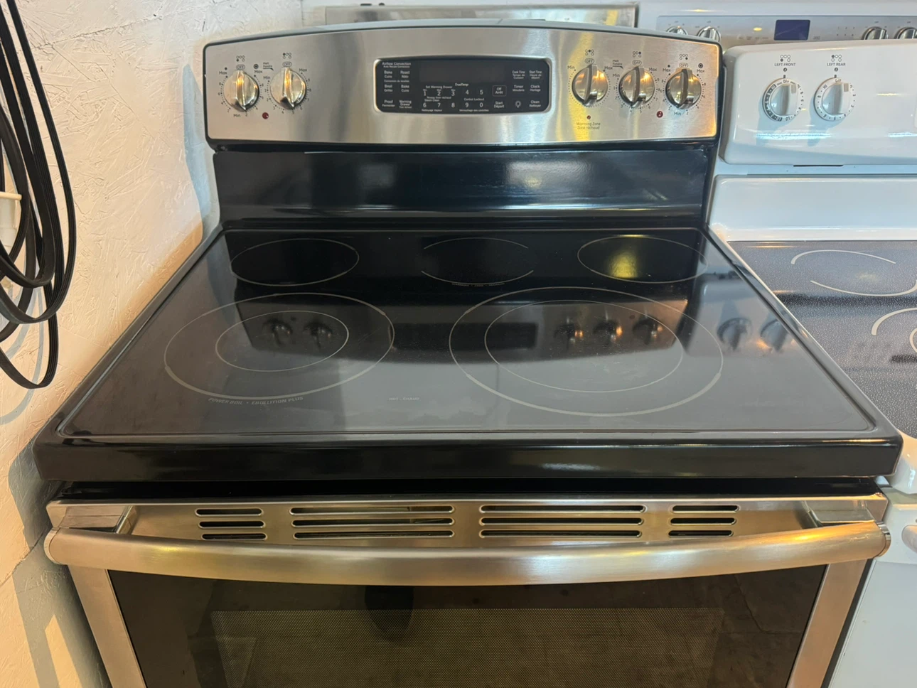 GE 30” Stainless Steel Electric Range - photo 2