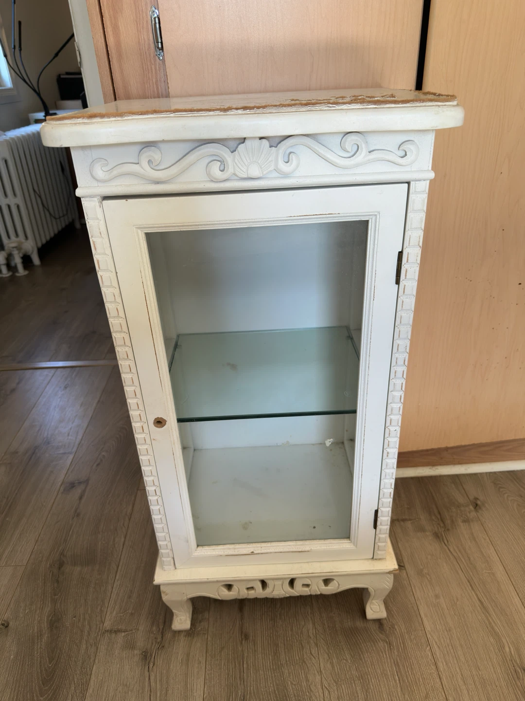 White ornate glass display cabinet