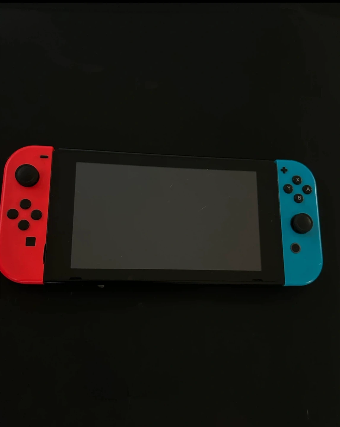 Nintendo Switch Console with Neon Red and Blue Joy-Cons