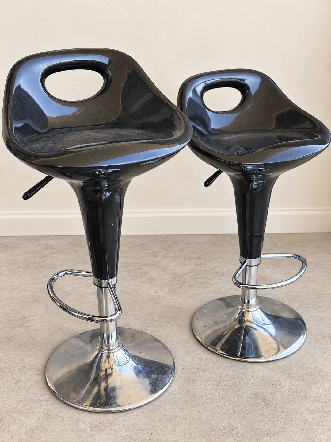Pair of Black Adjustable Bar Stools – $40