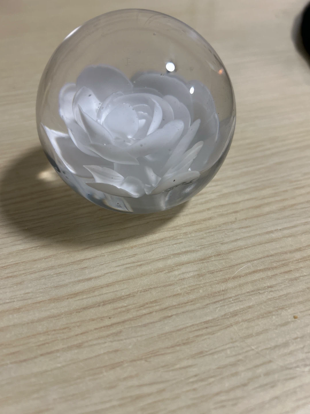 Glass Paperweight with White Flower Design