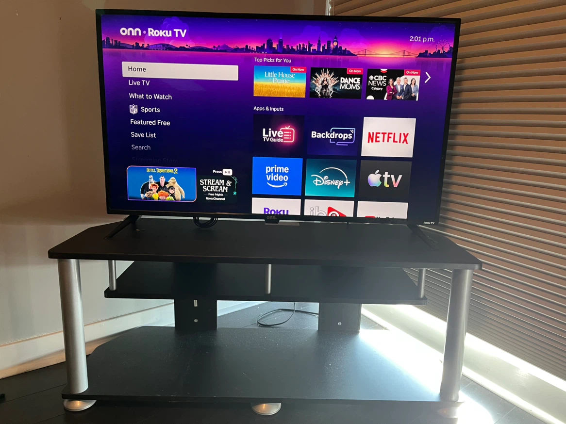 Onn. Roku  smart TV with stand also