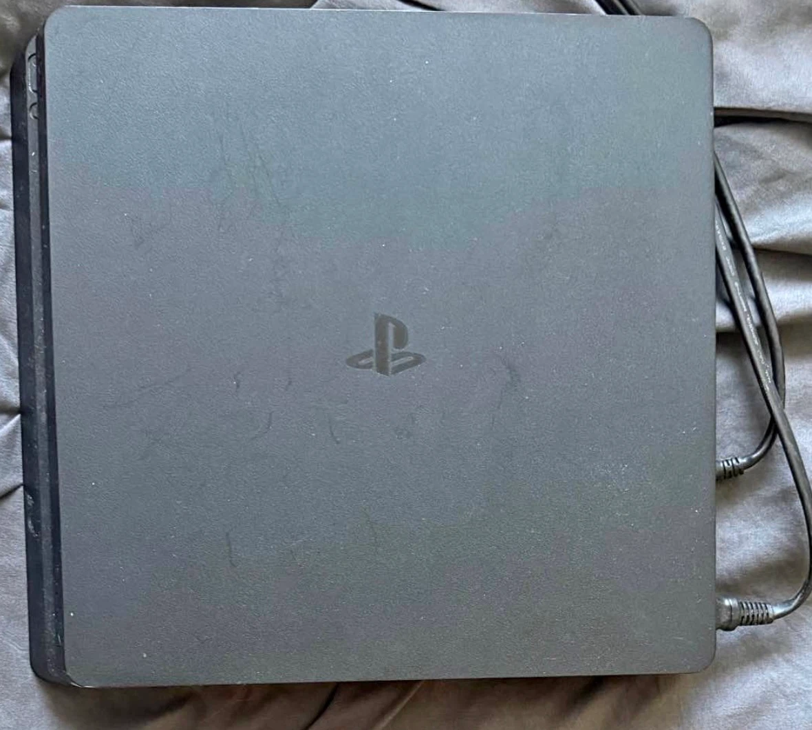 Sony PlayStation 4 Slim with 4 Games