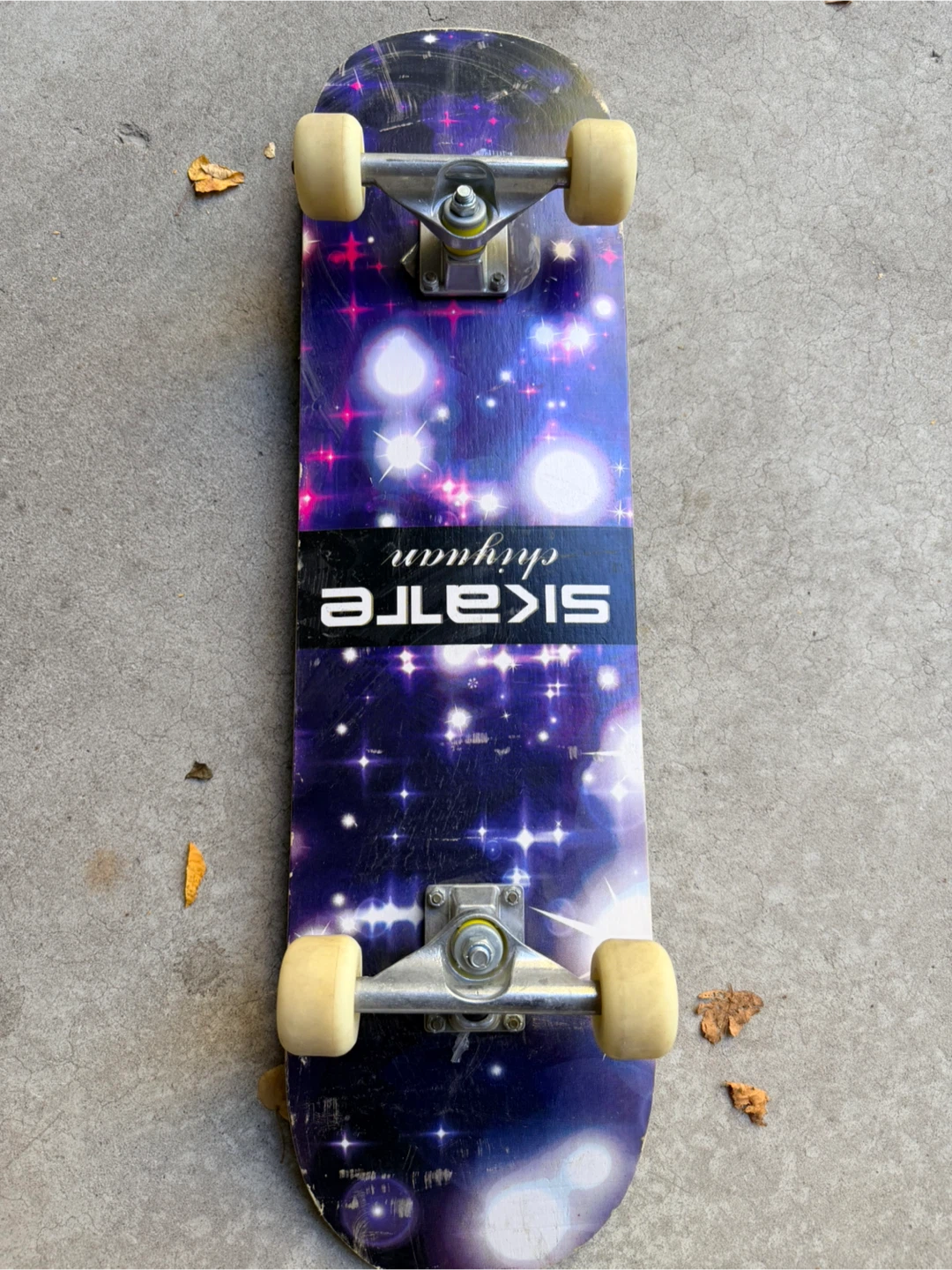Skateboard with Galaxy Graphic