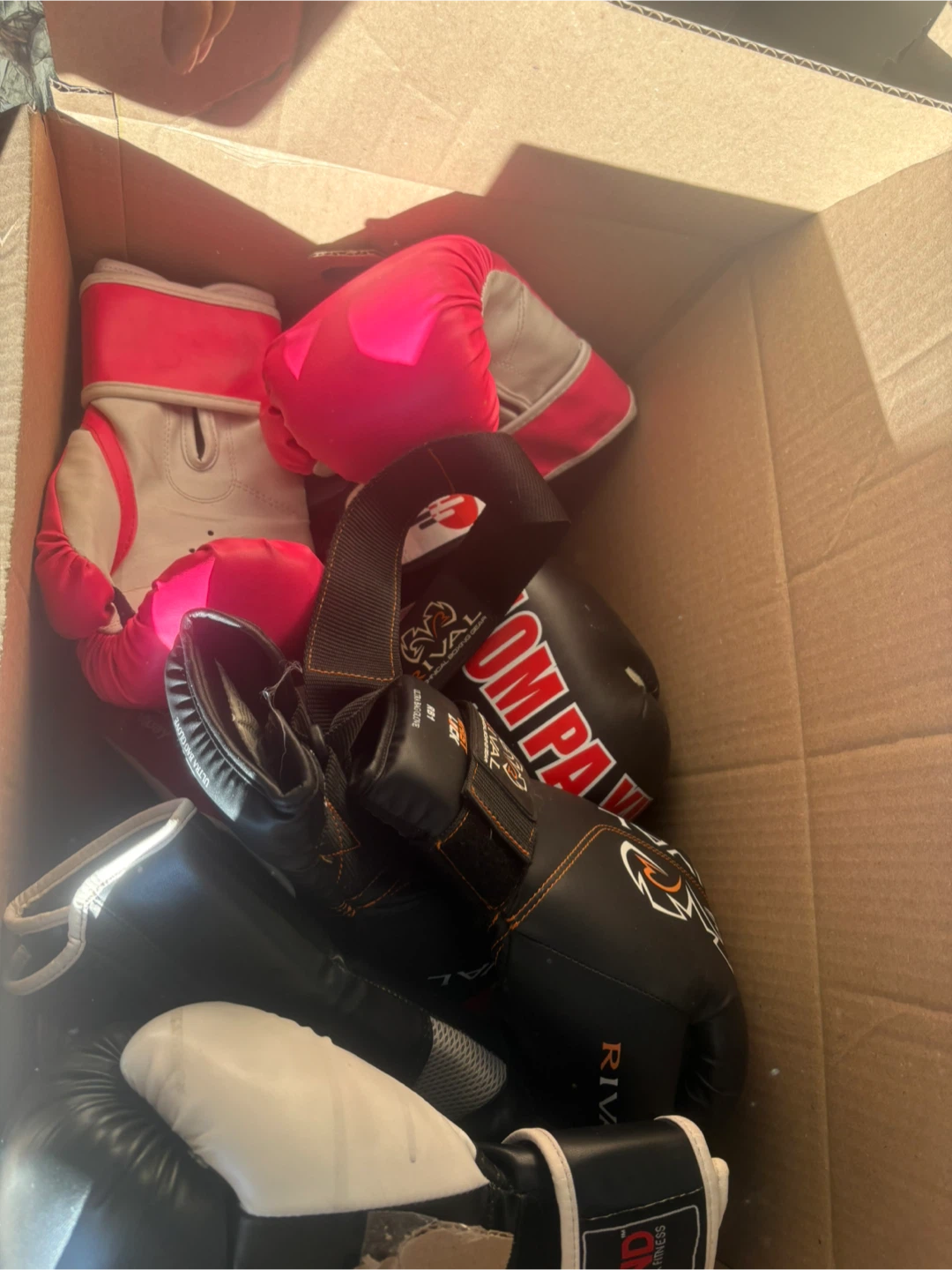 Assorted Boxing Gloves and Pads