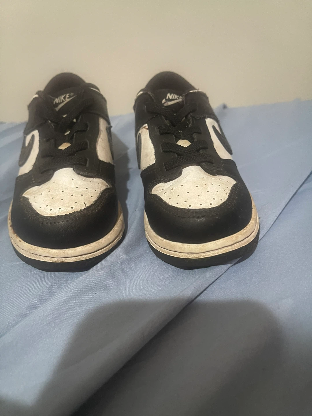 Two pairs of Nike children's sneakers