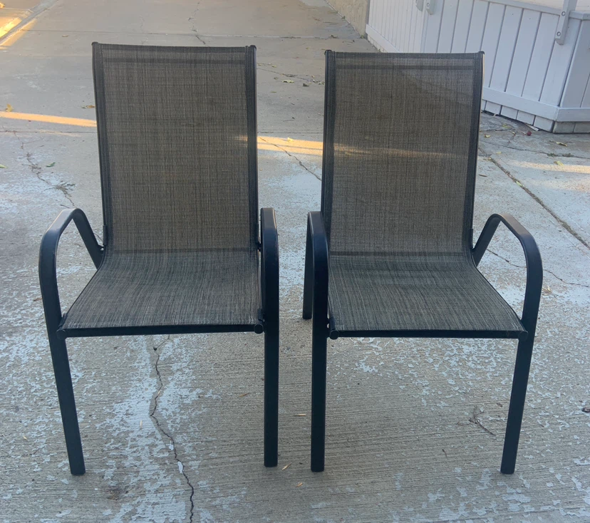 Two outdoor patio chairs