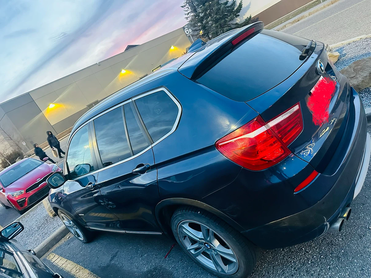 Blue BMW X3 SUV - photo 2