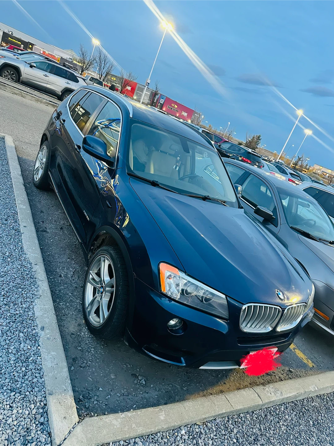Blue BMW X3 SUV - photo 3