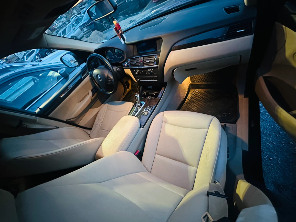 Blue BMW X3 SUV - photo 4