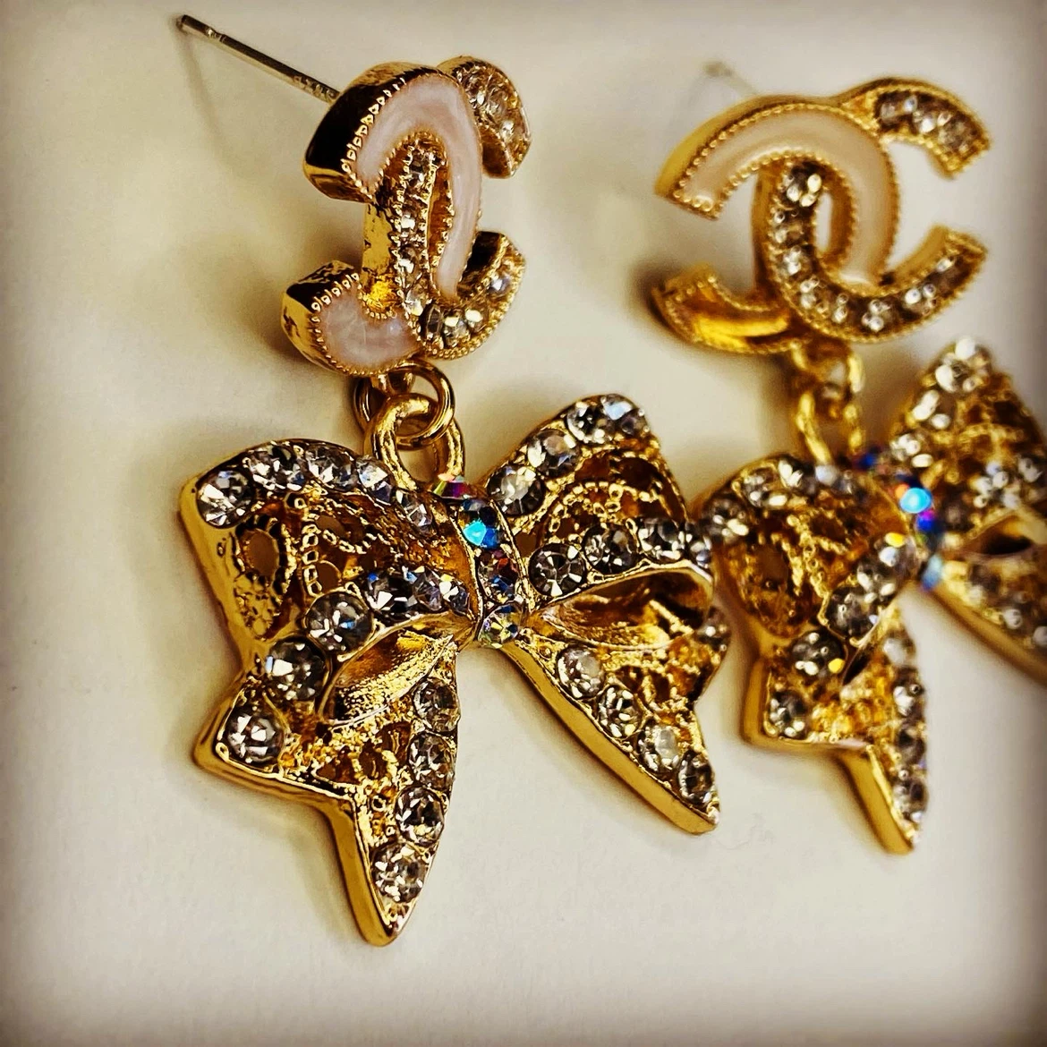 gold tone crystal bow earrings - photo 2
