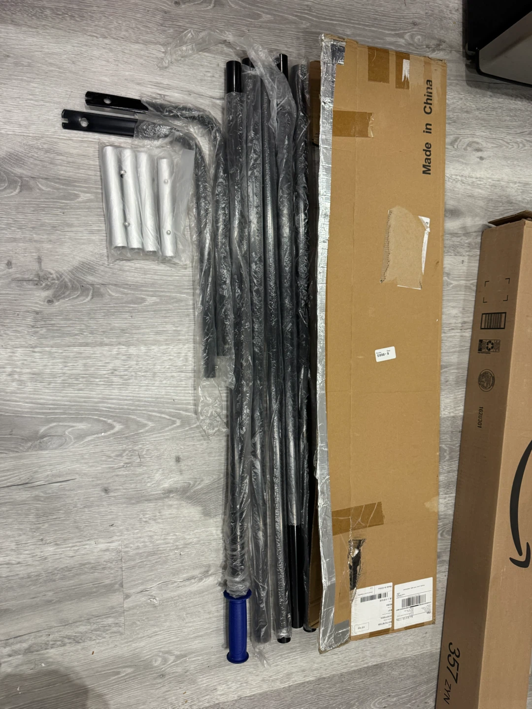 Unassembled Metal Frame Poles and Components