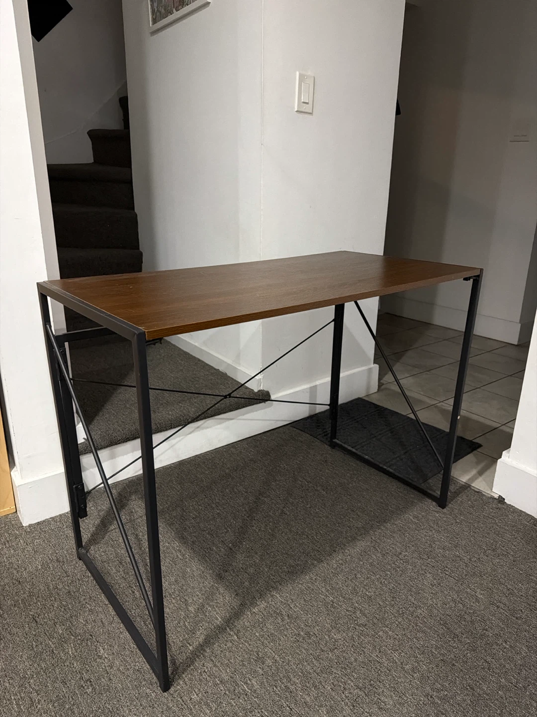 brown wood and black metal desk
