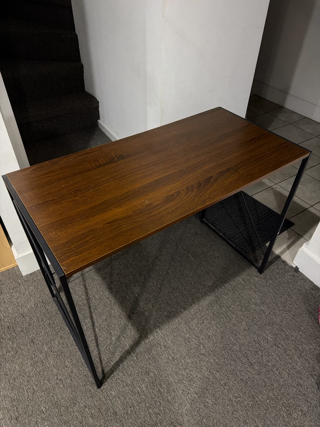 brown wood and black metal desk - photo 2