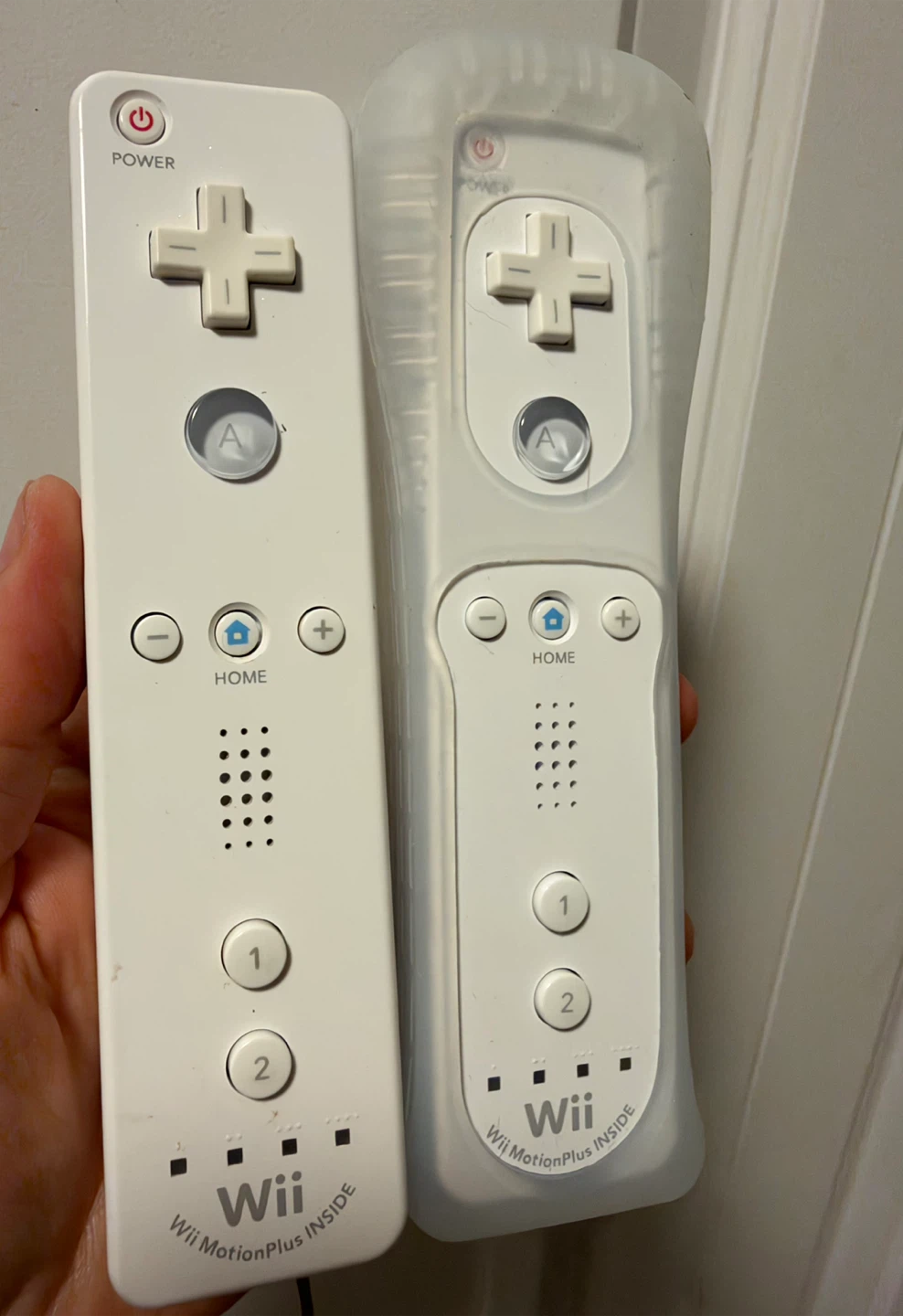 Two Nintendo Wii MotionPlus Remote Controllers