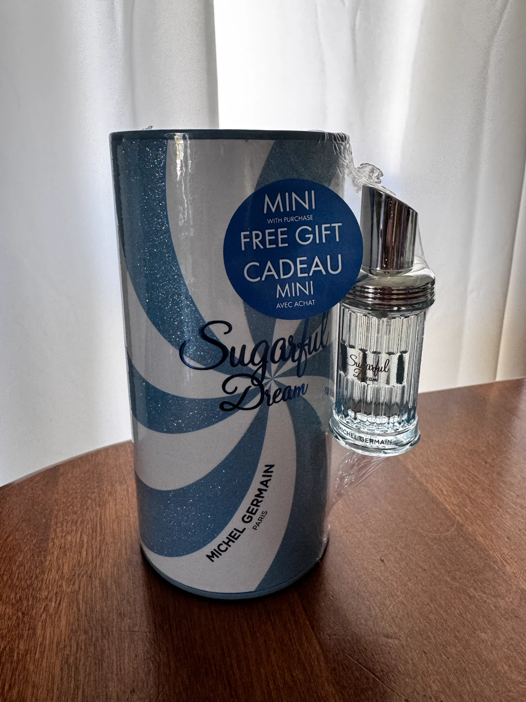 Perfume 100 ml plus a mini size new sealed $45 firm