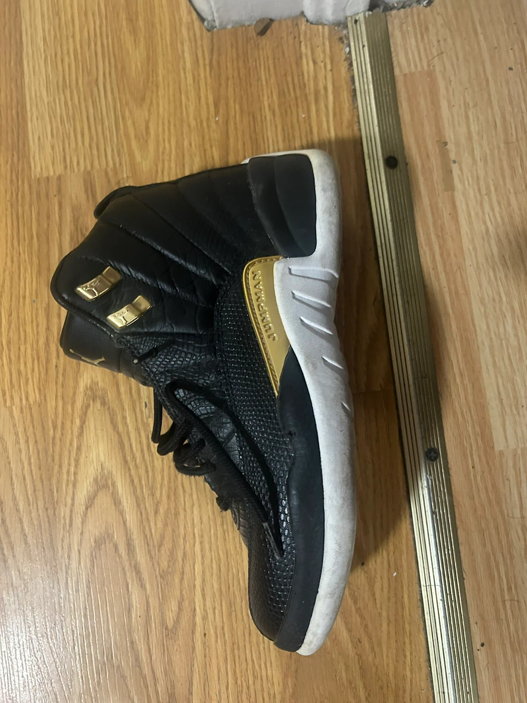 Air Jordan 12 Retro Black and Gold