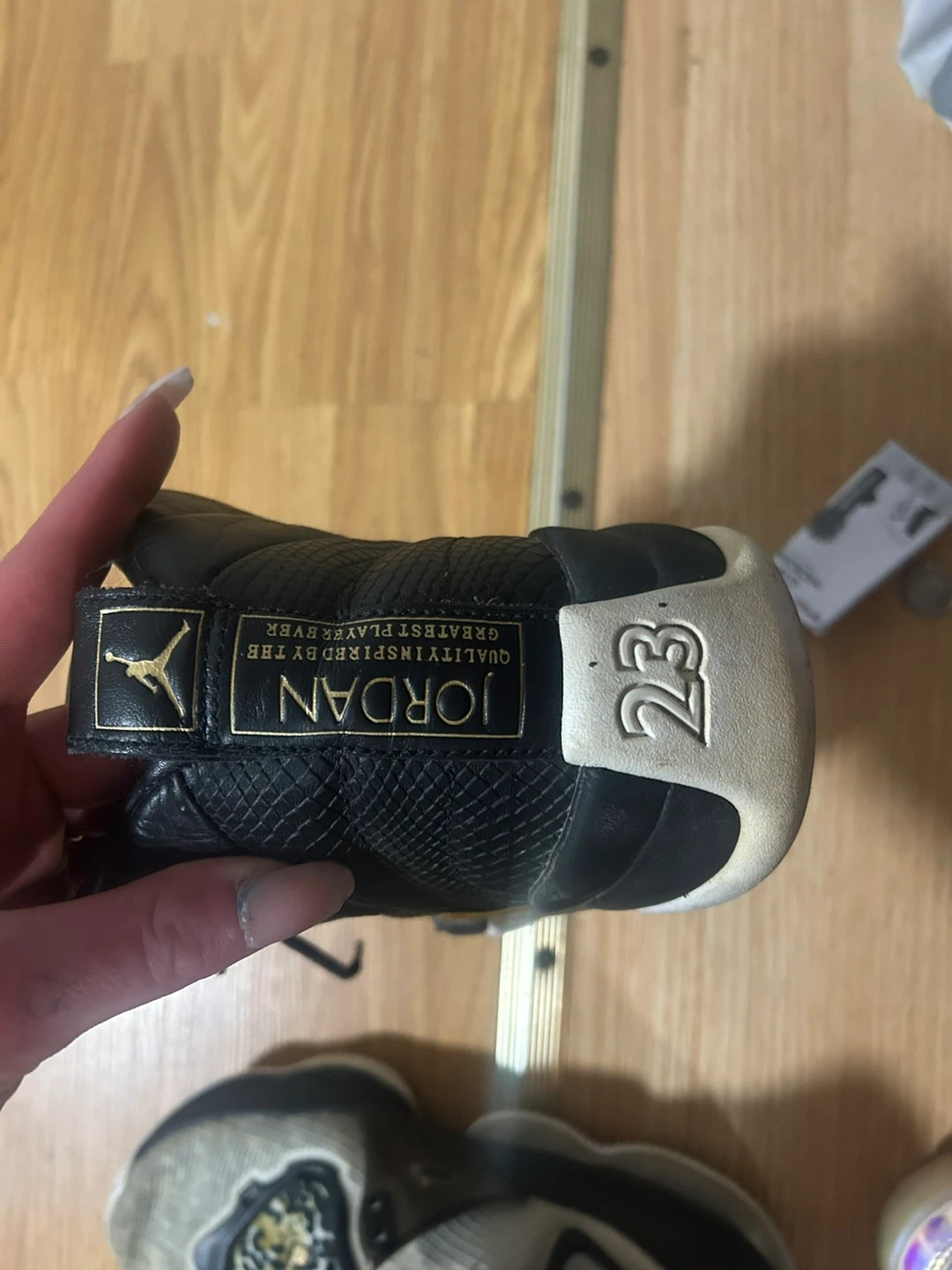 Air Jordan 12 Retro Black and Gold - photo 2