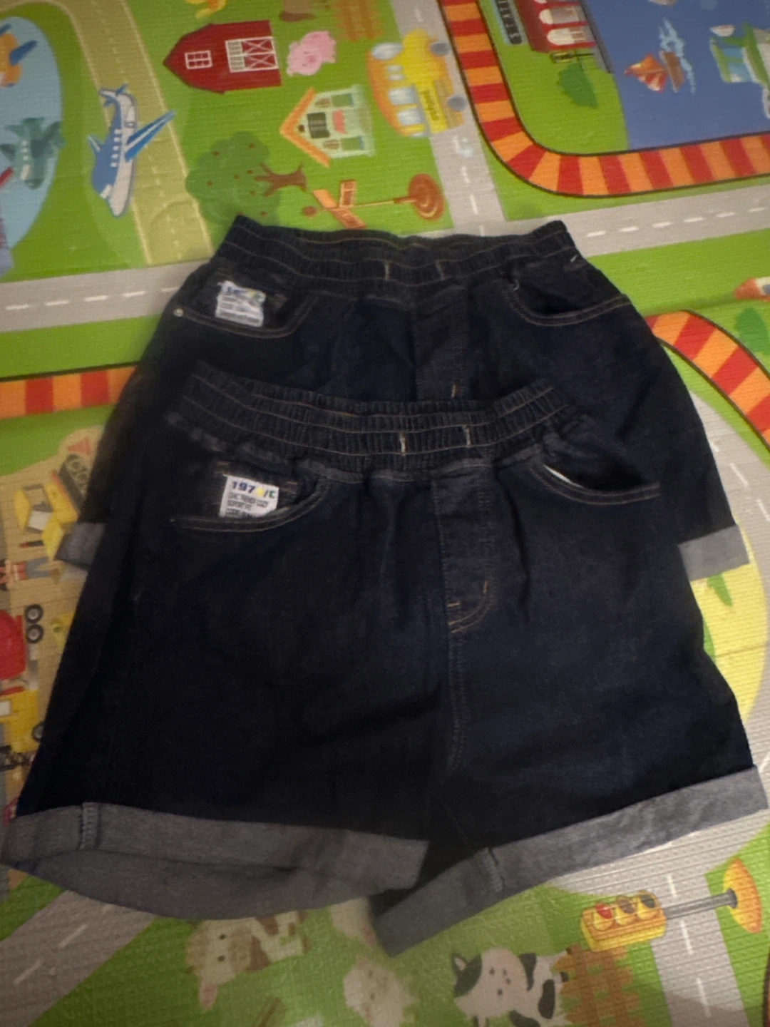Pair of dark blue denim shorts size 28