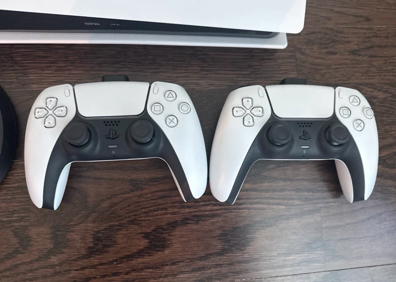 PlayStation 5 Console with Two Controllers and Surge Charger - photo 2