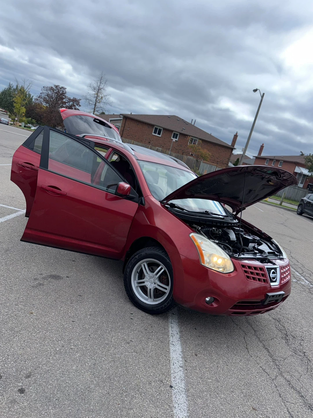 Red Nissan Rogue - photo 2