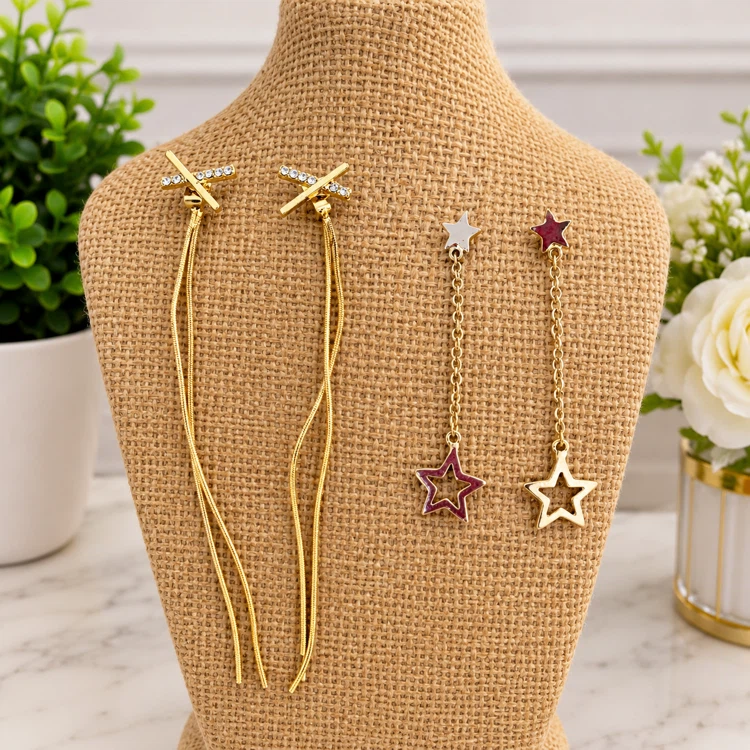 Two pairs of dangle earrings