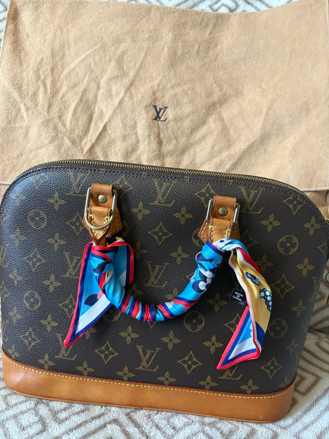 Louis Vuitton Alma PM Style Handbag