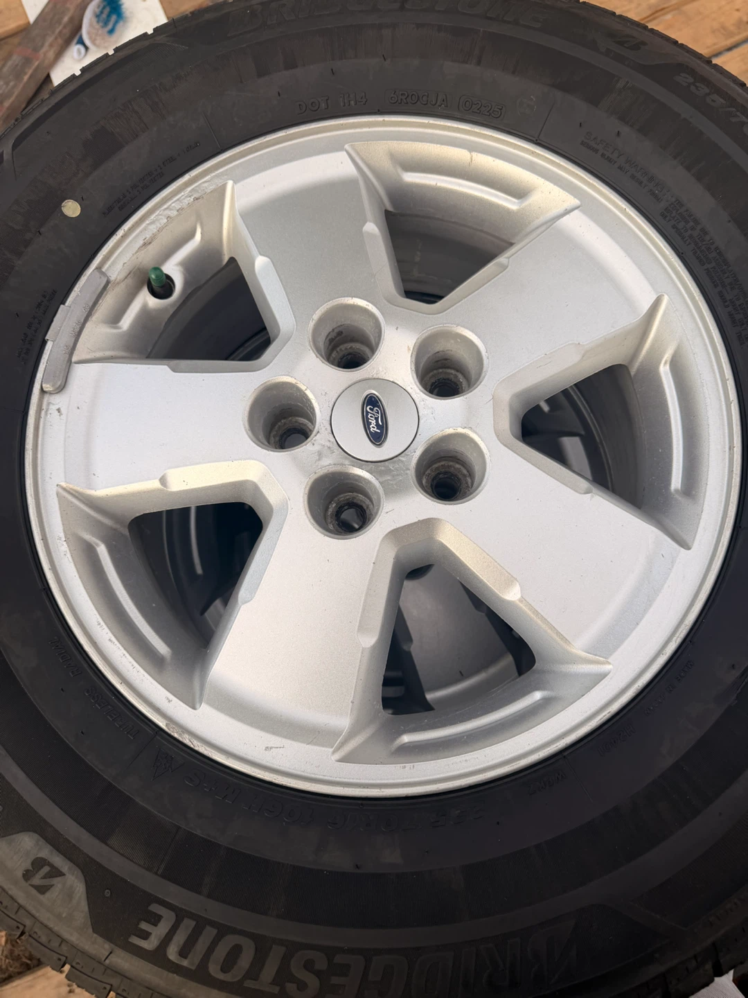 Set of 4 Bridgestone WeatherPeak Tires 235/70R16