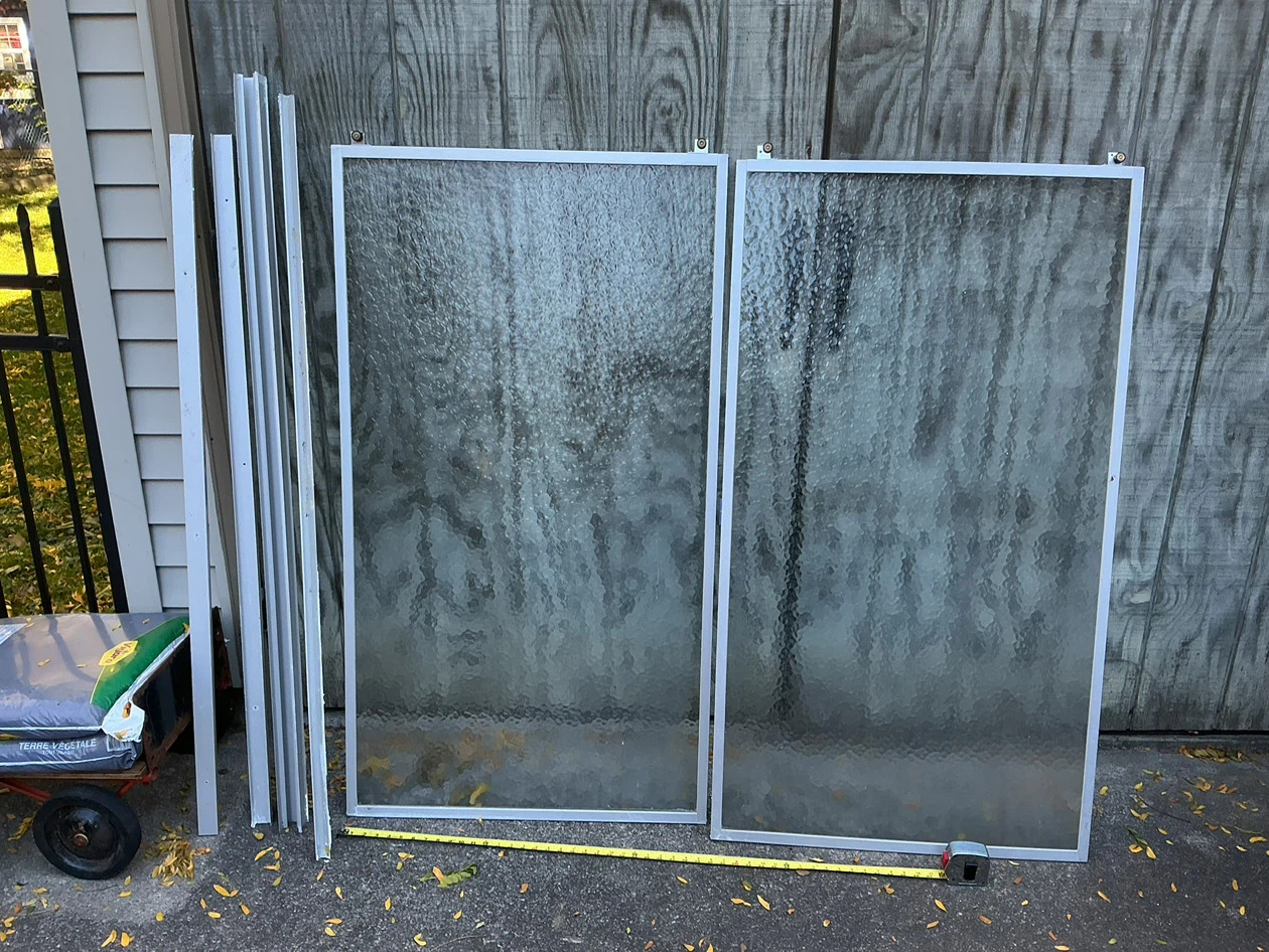 Two Sliding Shower Textured Glass Panels with Metal Frames