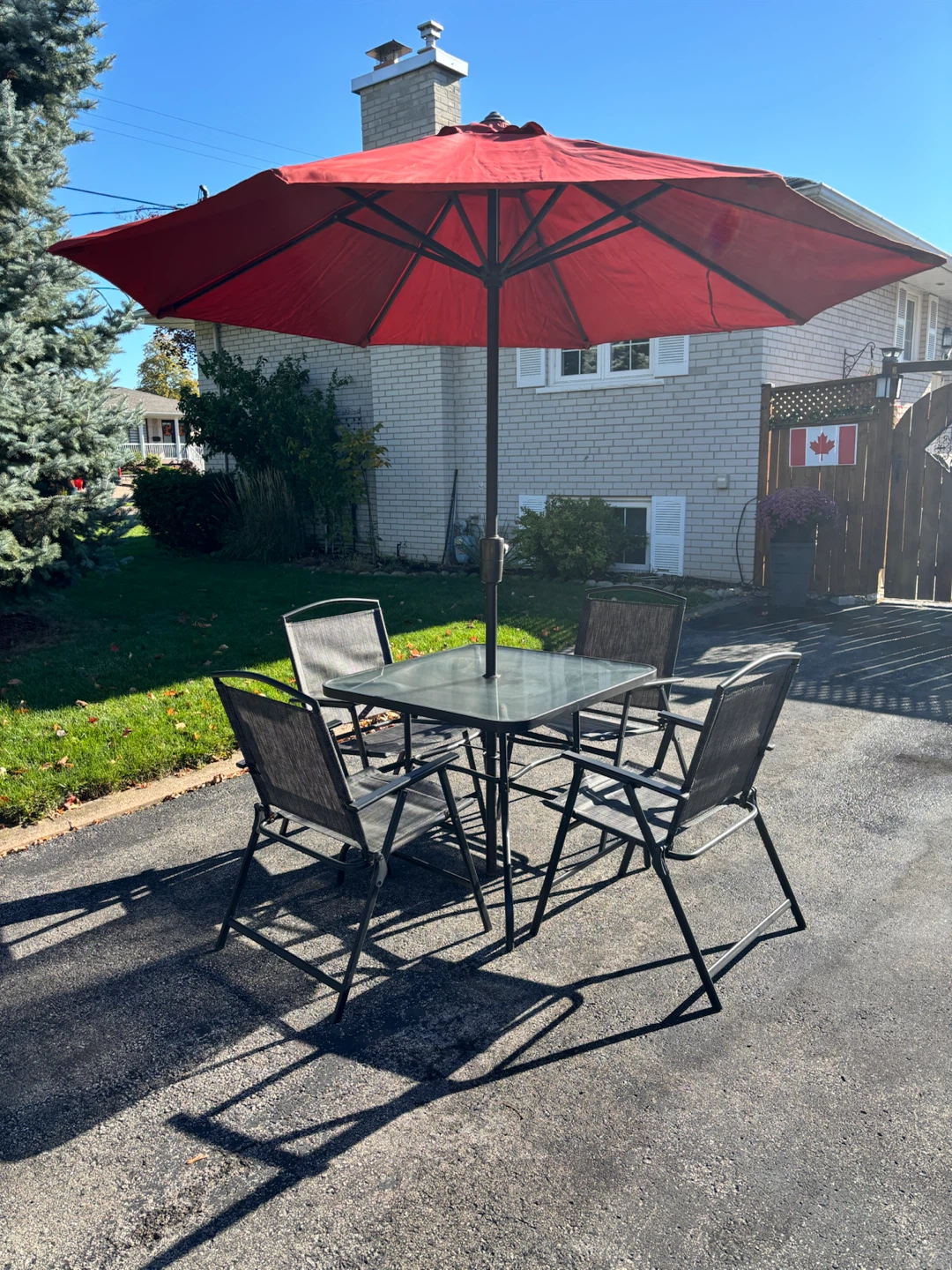 4 piece frosted glass patio table and chairs with umbrella
