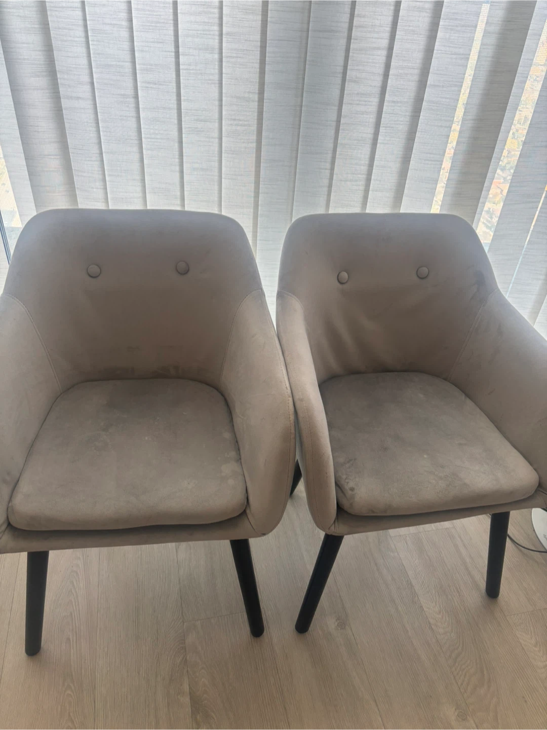 Two light grey velvet dining chairs